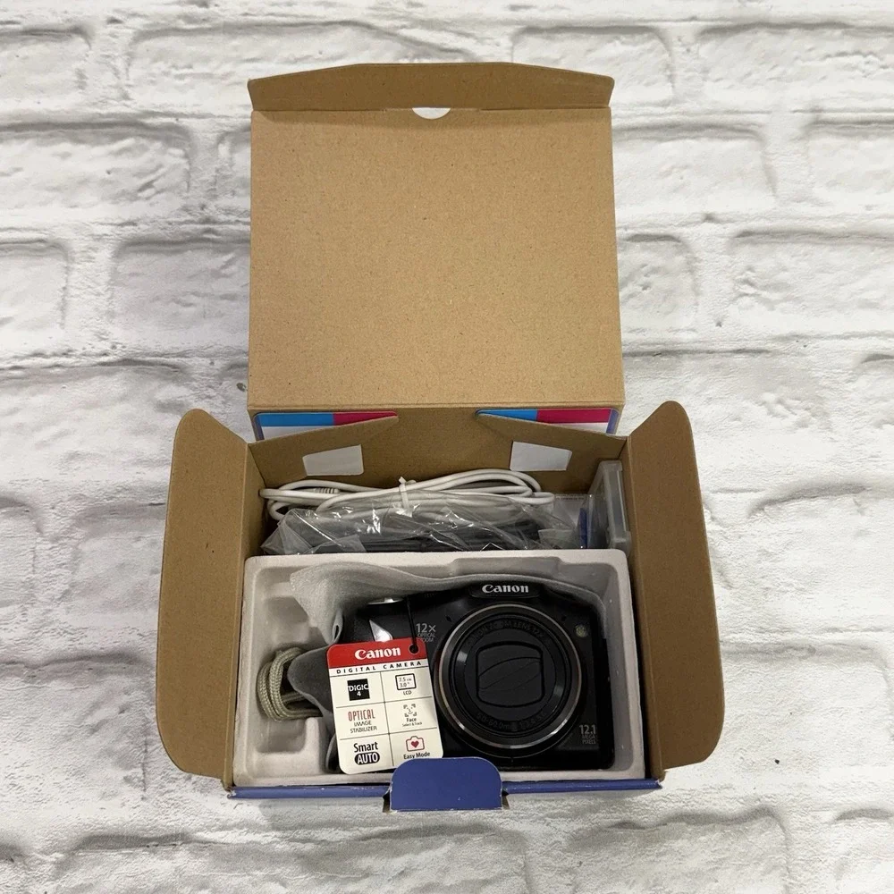 Canon SX130 IS Powershot Digital Camera 12x Optical Zoom 12.1 MP Black Excellent